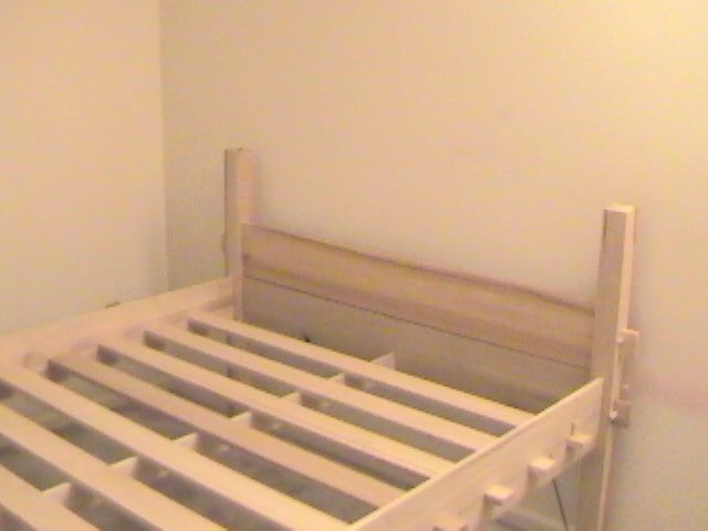 assembled bed, looking towards head board